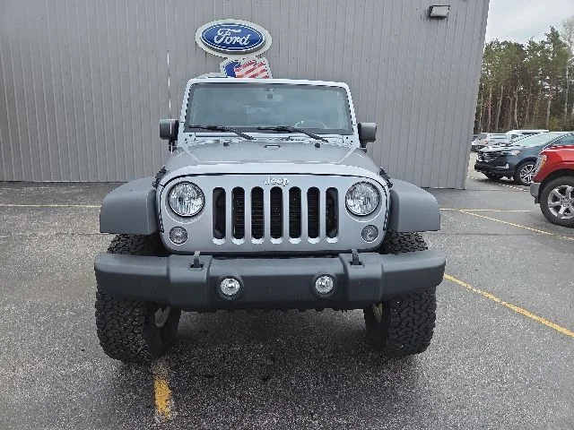 Used 2015 Jeep Wrangler Unlimited Sport with VIN 1C4BJWDG0FL654343 for sale in Manistee, MI