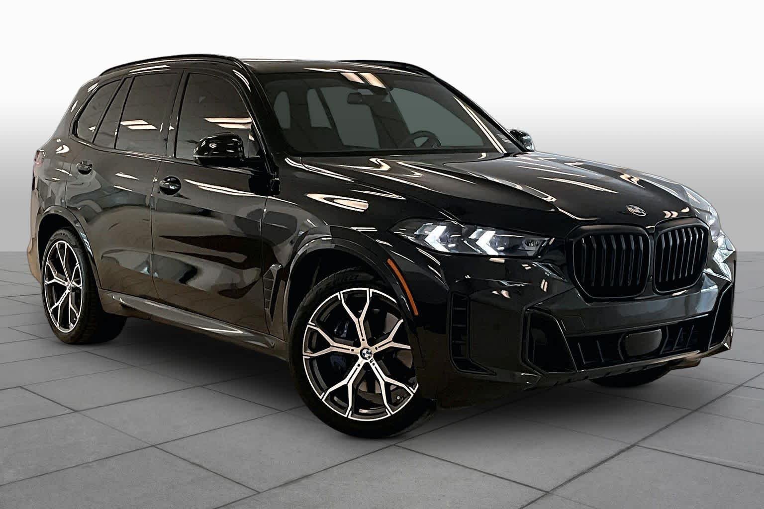 Used 2024 Black Sapphire Metallic BMW sDrive40i image 2