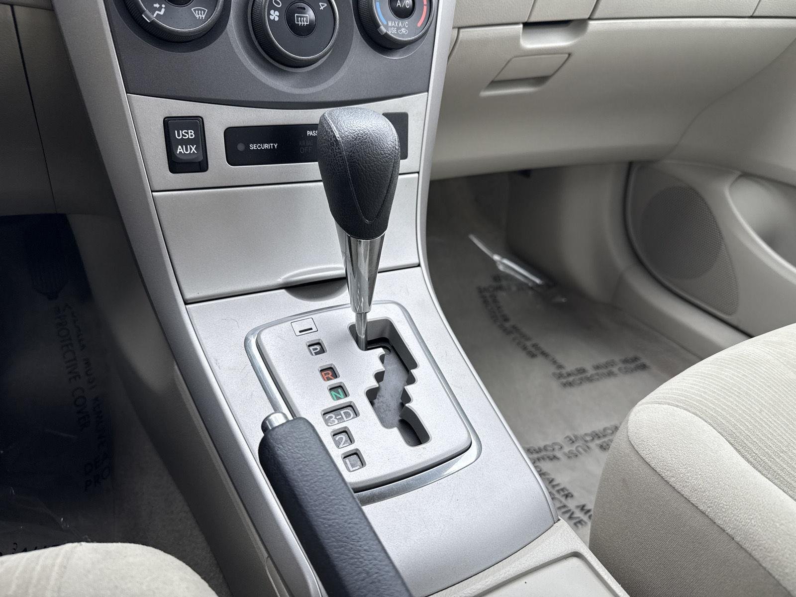Used 2013 Super White Toyota LE image 18