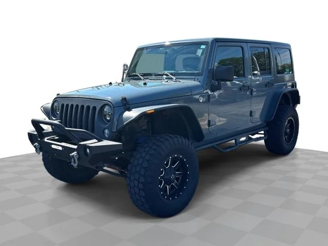 Used 2015 Gray Jeep Unlimited Sport image 1