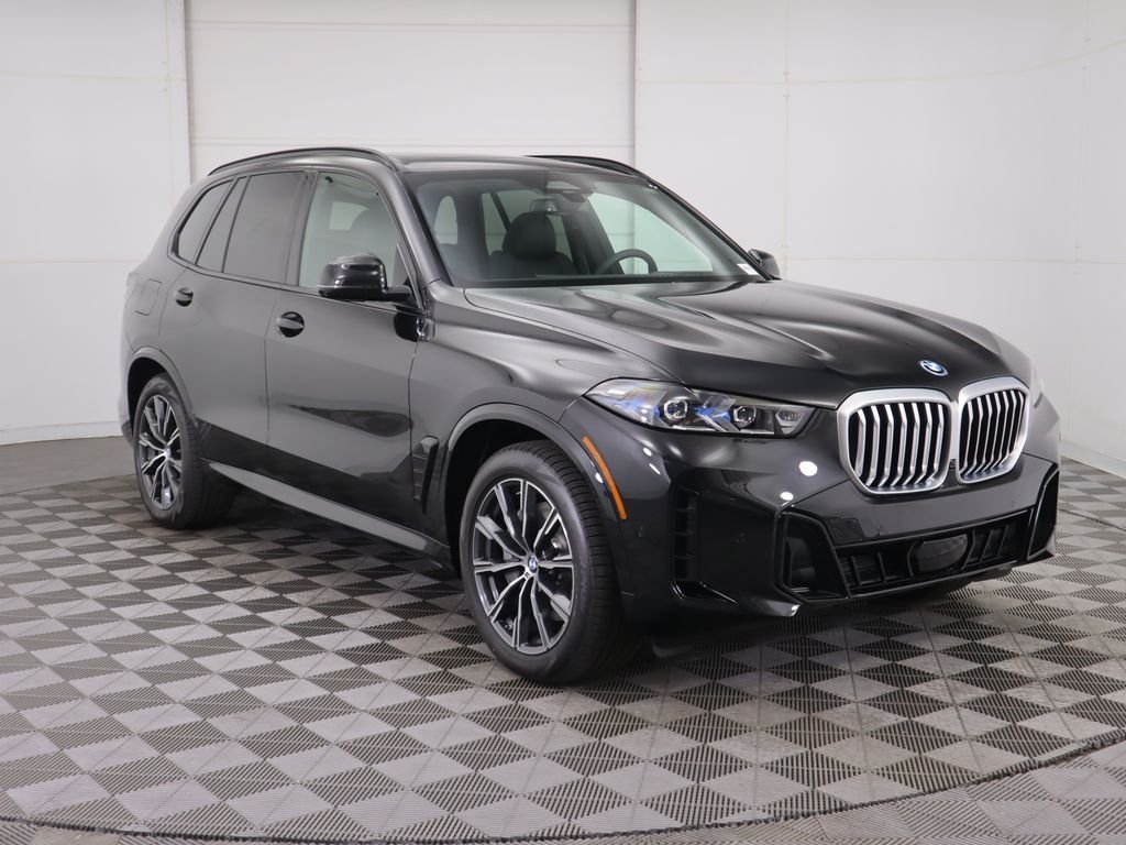 Used 2026 Black Sapphire Metallic BMW xDrive50e image 4