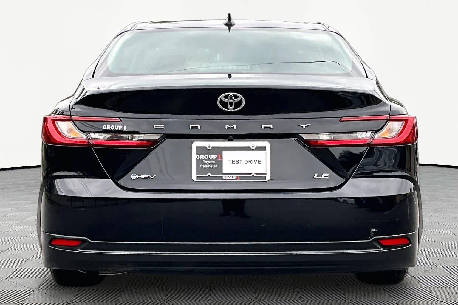 Used 2025 Midnight Black Metallic Toyota LE image 4