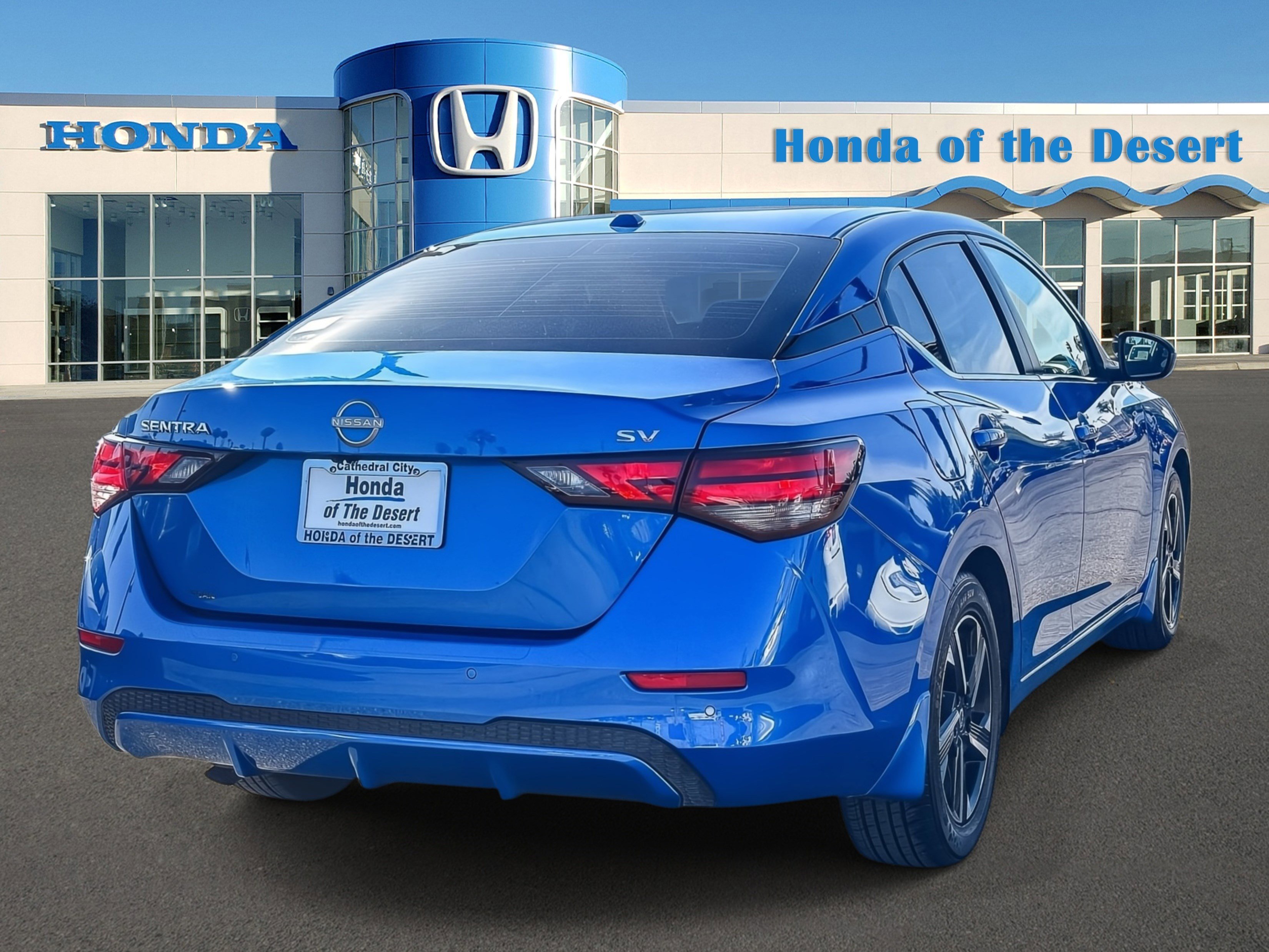Used 2024 Electric Blue Metallic Nissan SV image 6