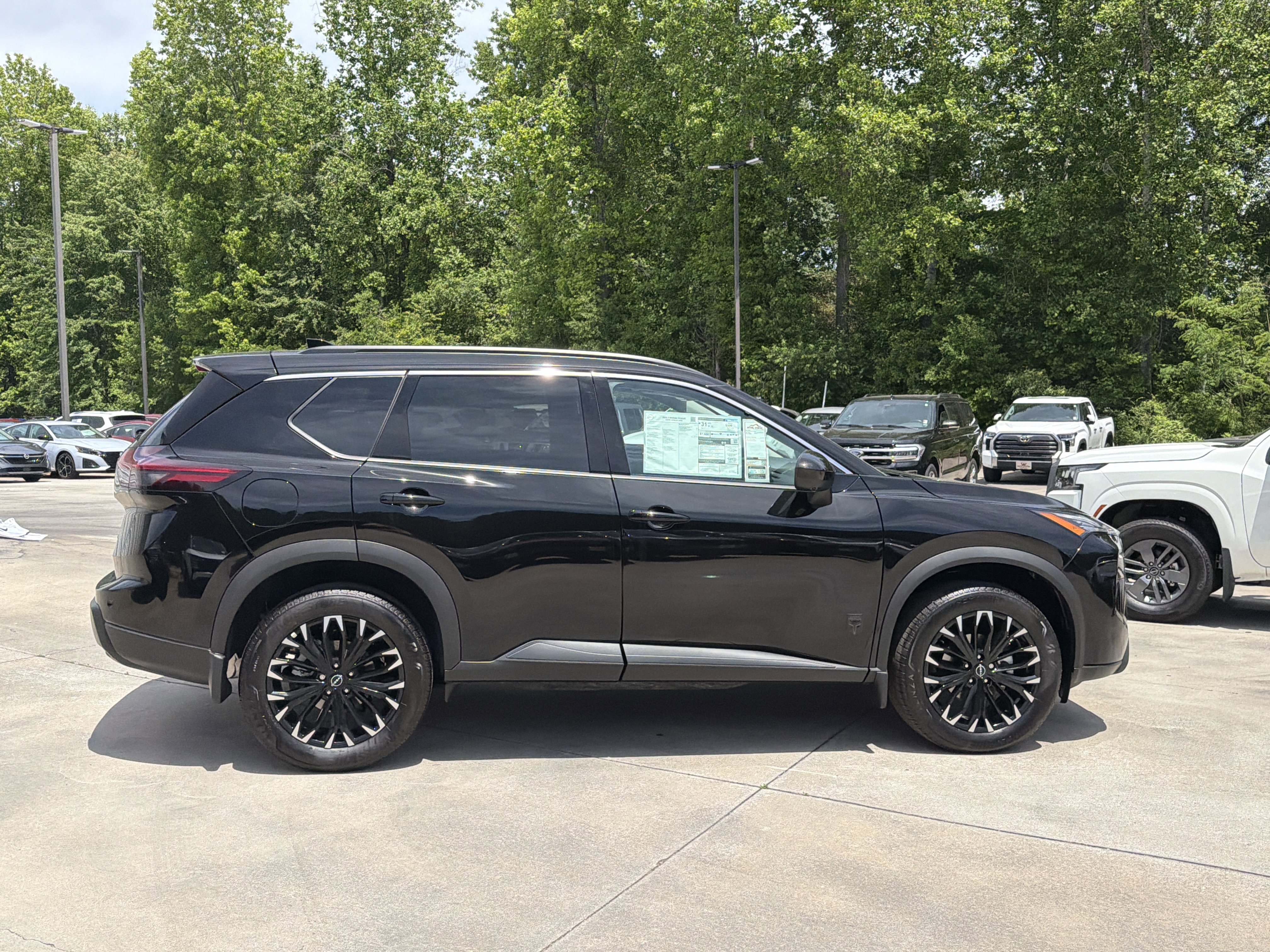 New 2026 Super Black Nissan Dark Armor image 9