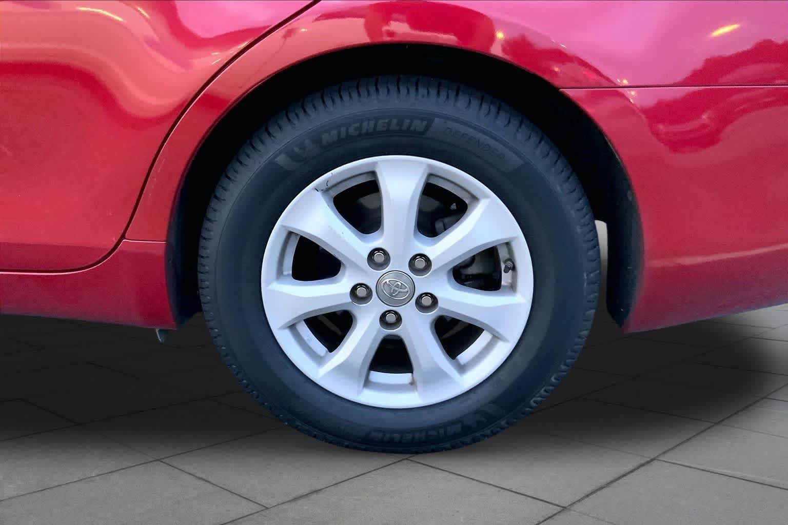 Used 2010 Barcelona Red Metallic Toyota LE image 10