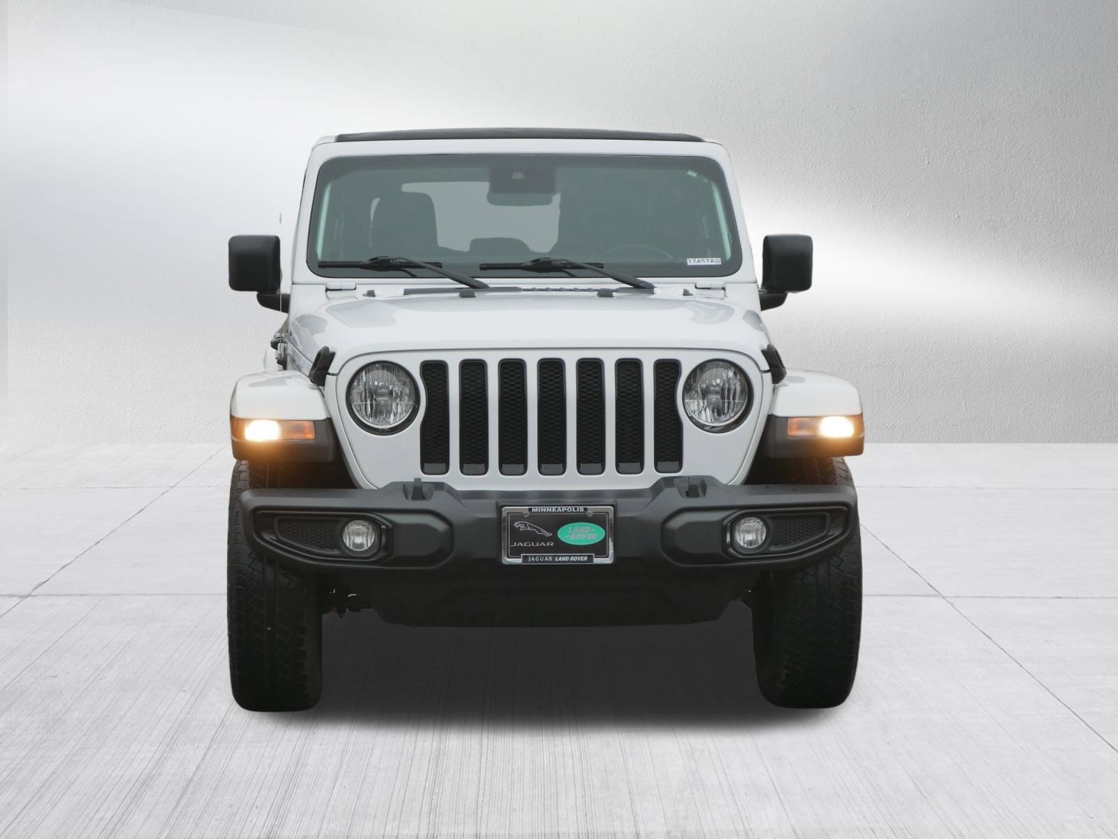 Used 2021 Jeep Wrangler Unlimited Sahara Altitude with VIN 1C4HJXEG0MW612457 for sale in Minneapolis, Minnesota