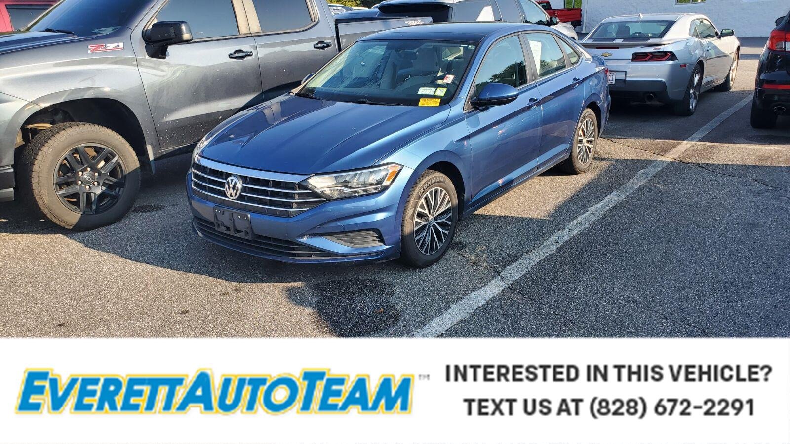 Used 2020 Blue Silk Metallic Volkswagen S image 1