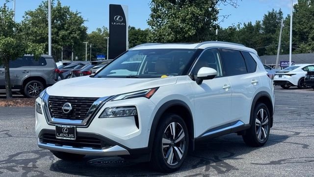 Used 2023 Pearl White Tricoat Nissan Platinum image 1