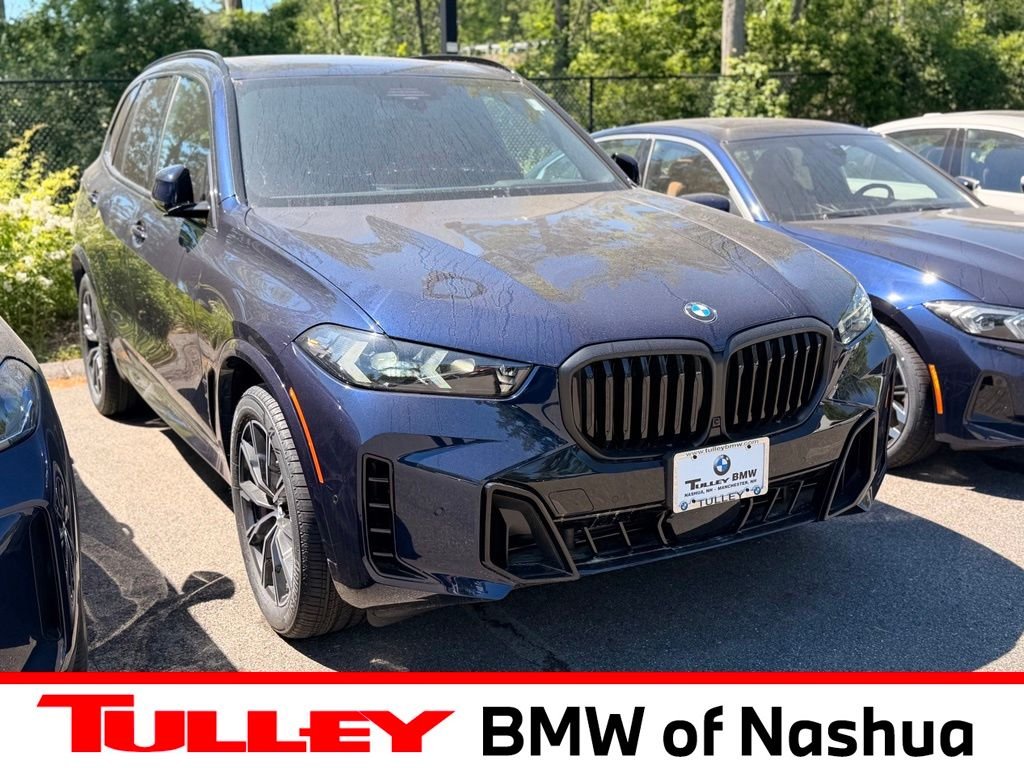 New 2026 Tanzanite Blue II Metallic BMW xDrive40i image 1