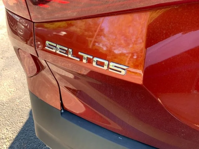 Used 2021 Orange Kia S image 7