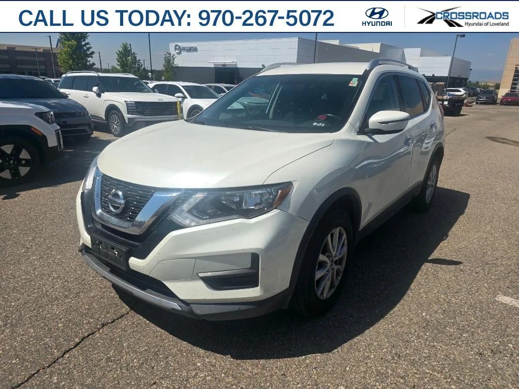Used 2017 Pearl White Nissan SV image 1