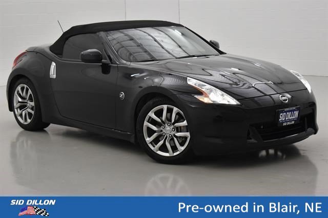 Used 2011 Magnetic Black Metallic Nissan Touring image 11