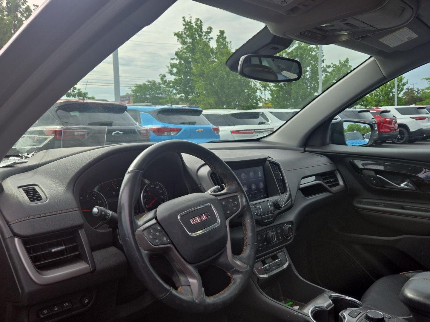Used 2023 Ebony Twilight Metallic GMC AT4 image 2