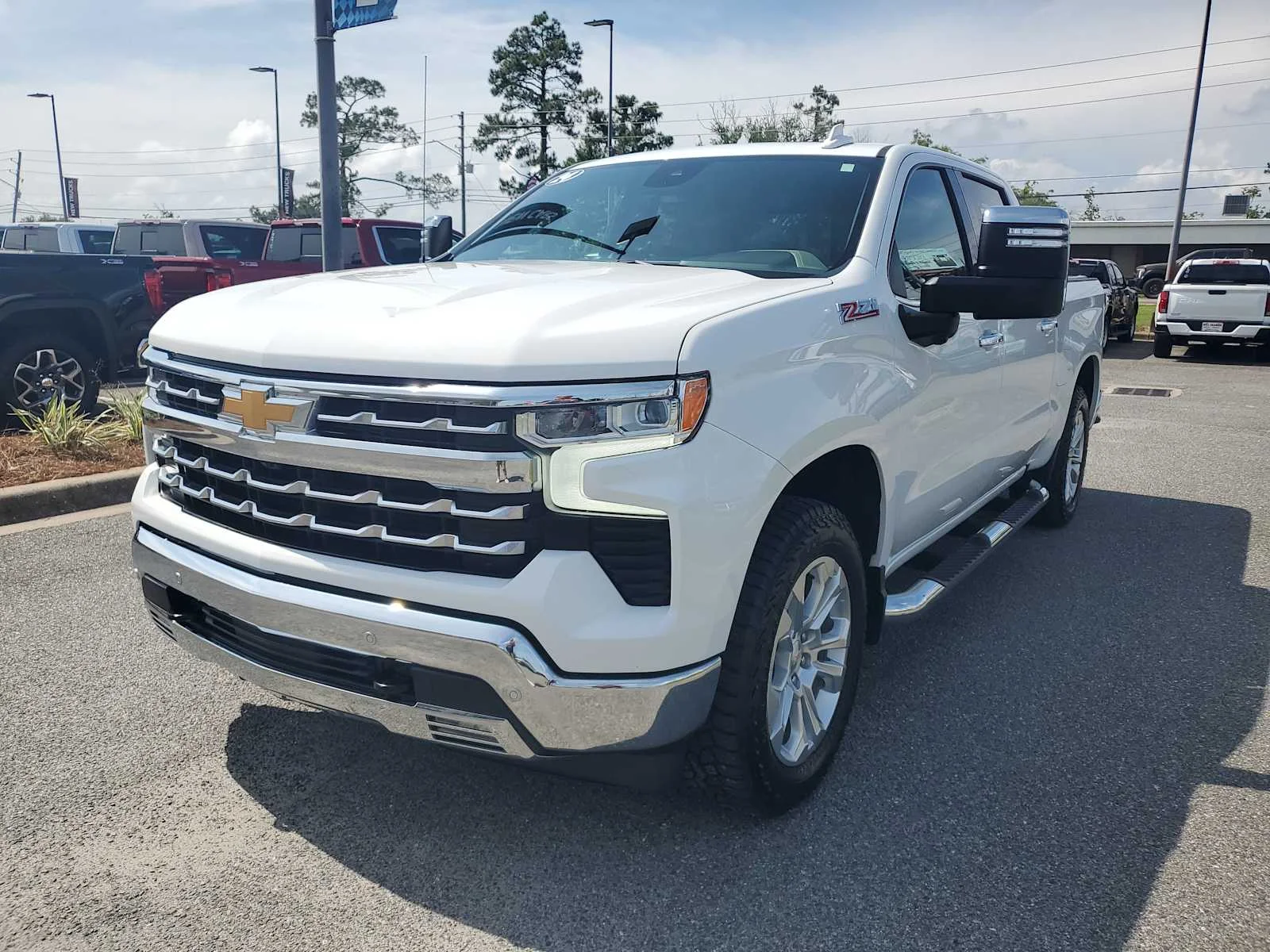 Used 2024 Summit White Chevrolet LTZ image 1