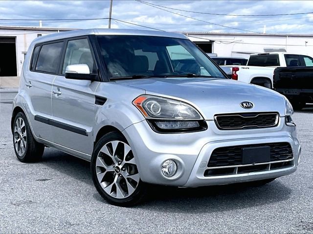 Used 2013 Bright Silver Met Kia ! image 1