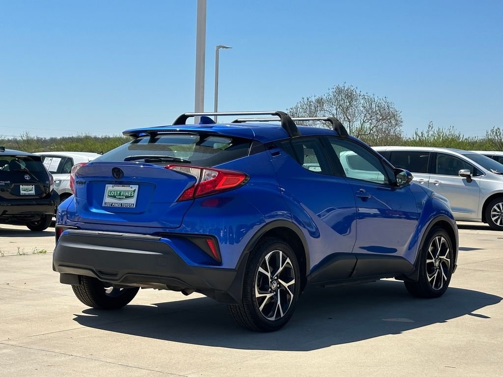 Used 2021 Toyota C-HR XLE with VIN NMTKHMBX8MR125588 for sale in Bastrop, TX