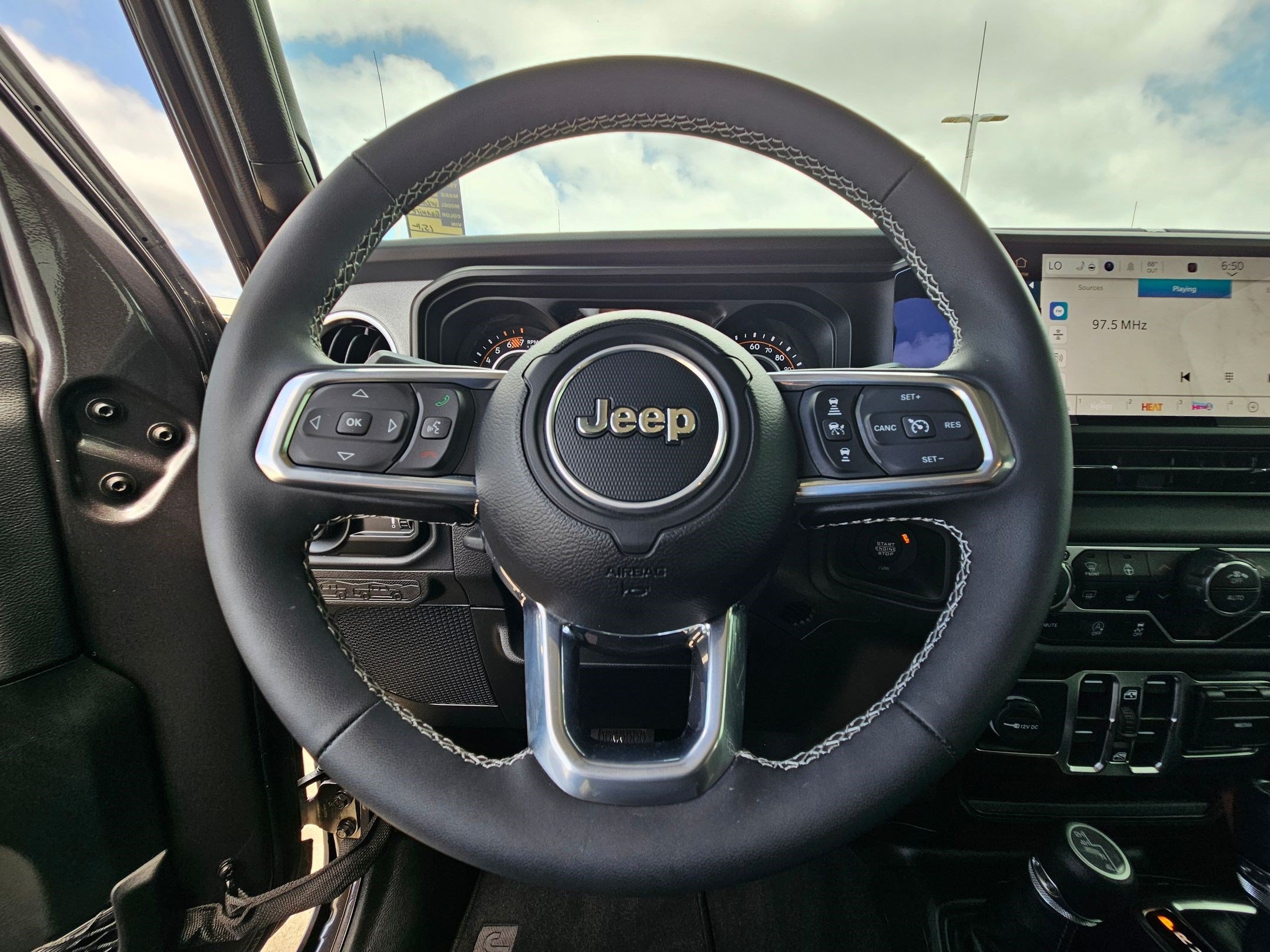 Used 2025 Granite Crystal Clearcoat Metallic Jeep Sahara image 14