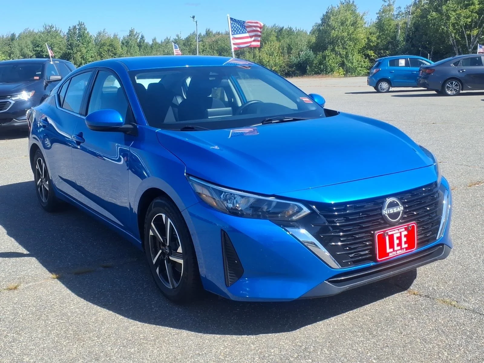 Used 2025 Electric Blue Metallic Nissan SV image 3