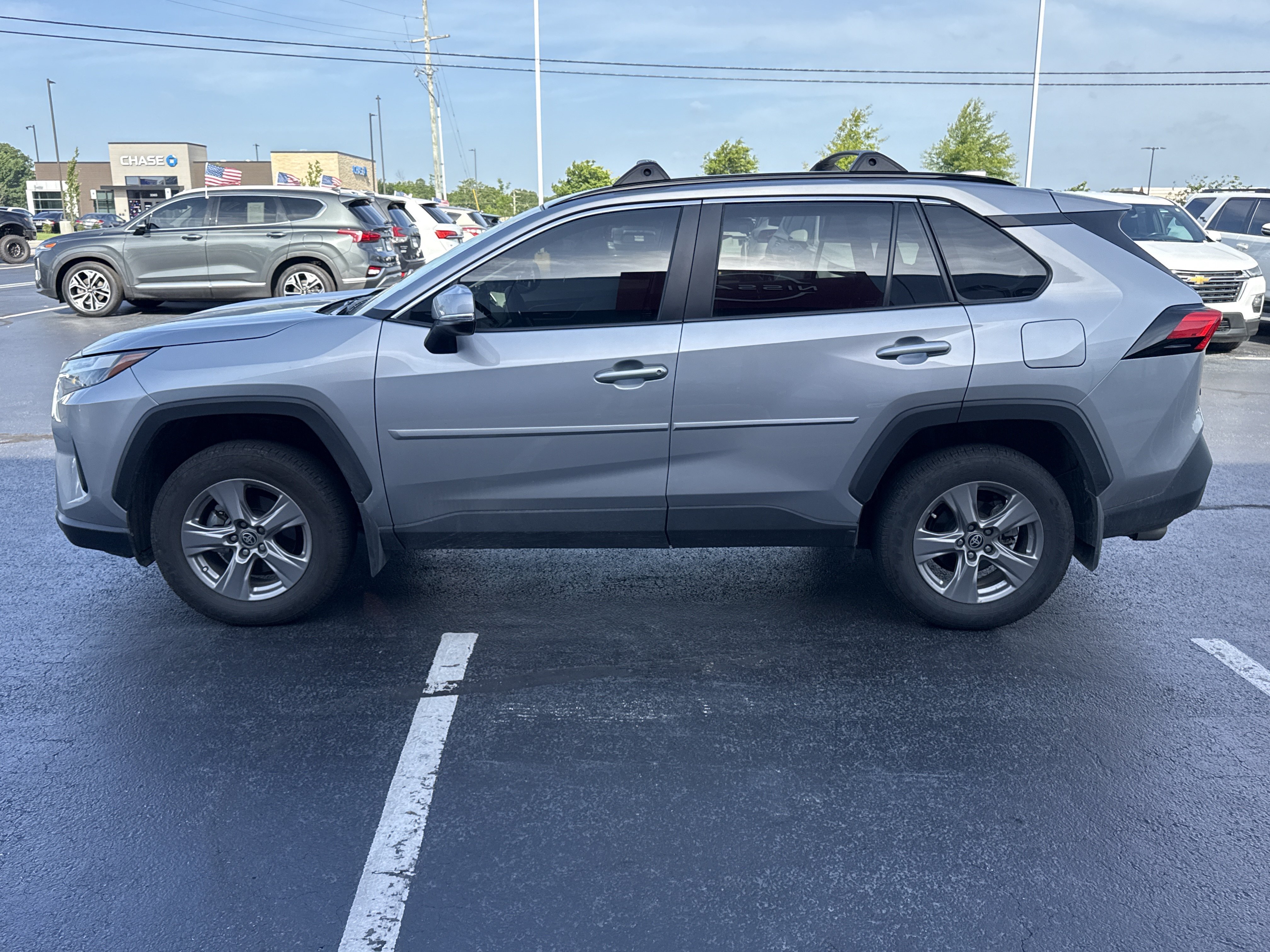 Used 2025 Silver Sky Metallic Toyota XLE AWD image 3
