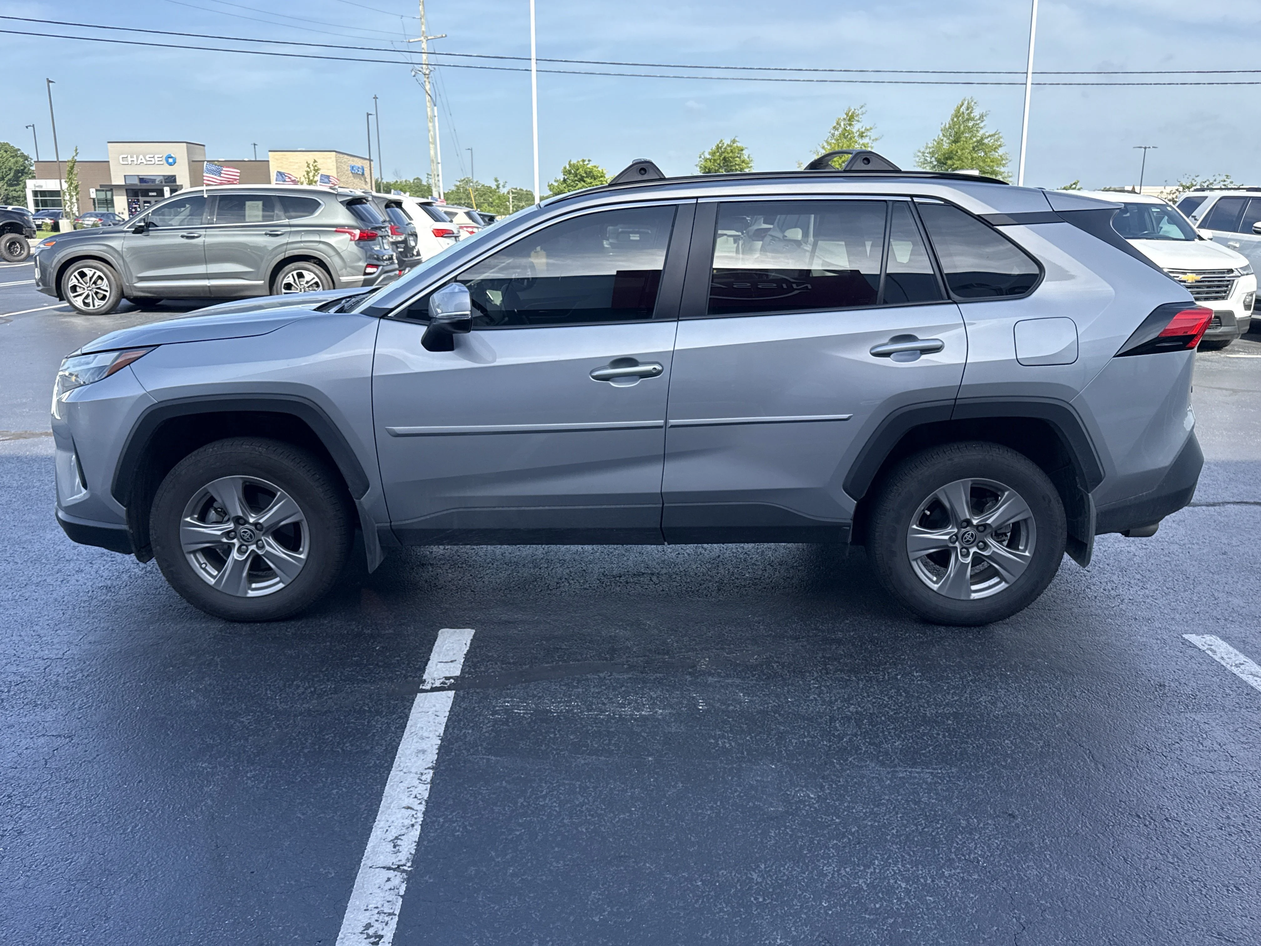 Used 2025 Silver Sky Metallic Toyota XLE AWD image 3