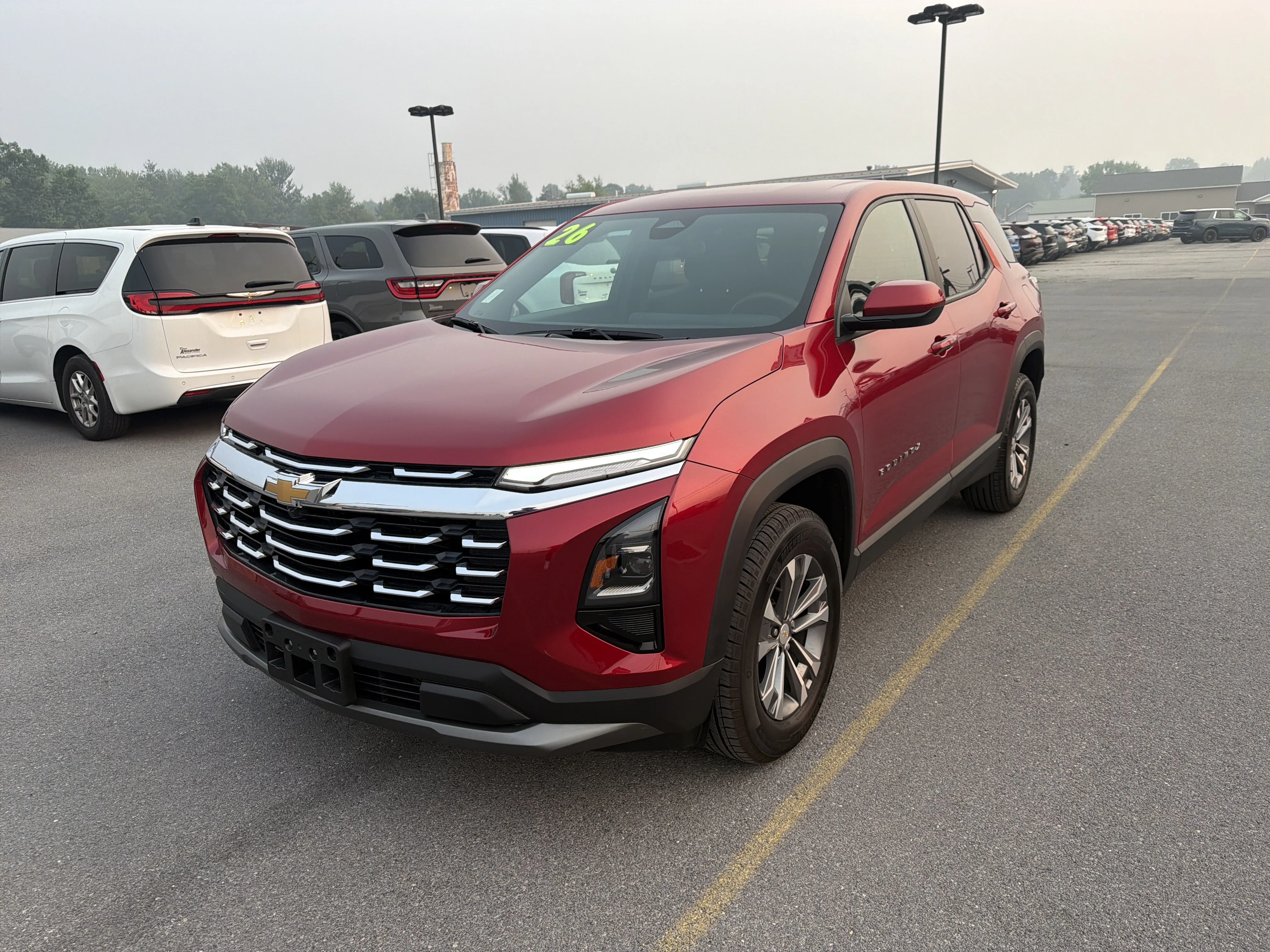 Used 2026 Radiant Red Tintcoat Chevrolet AWD LT image 2