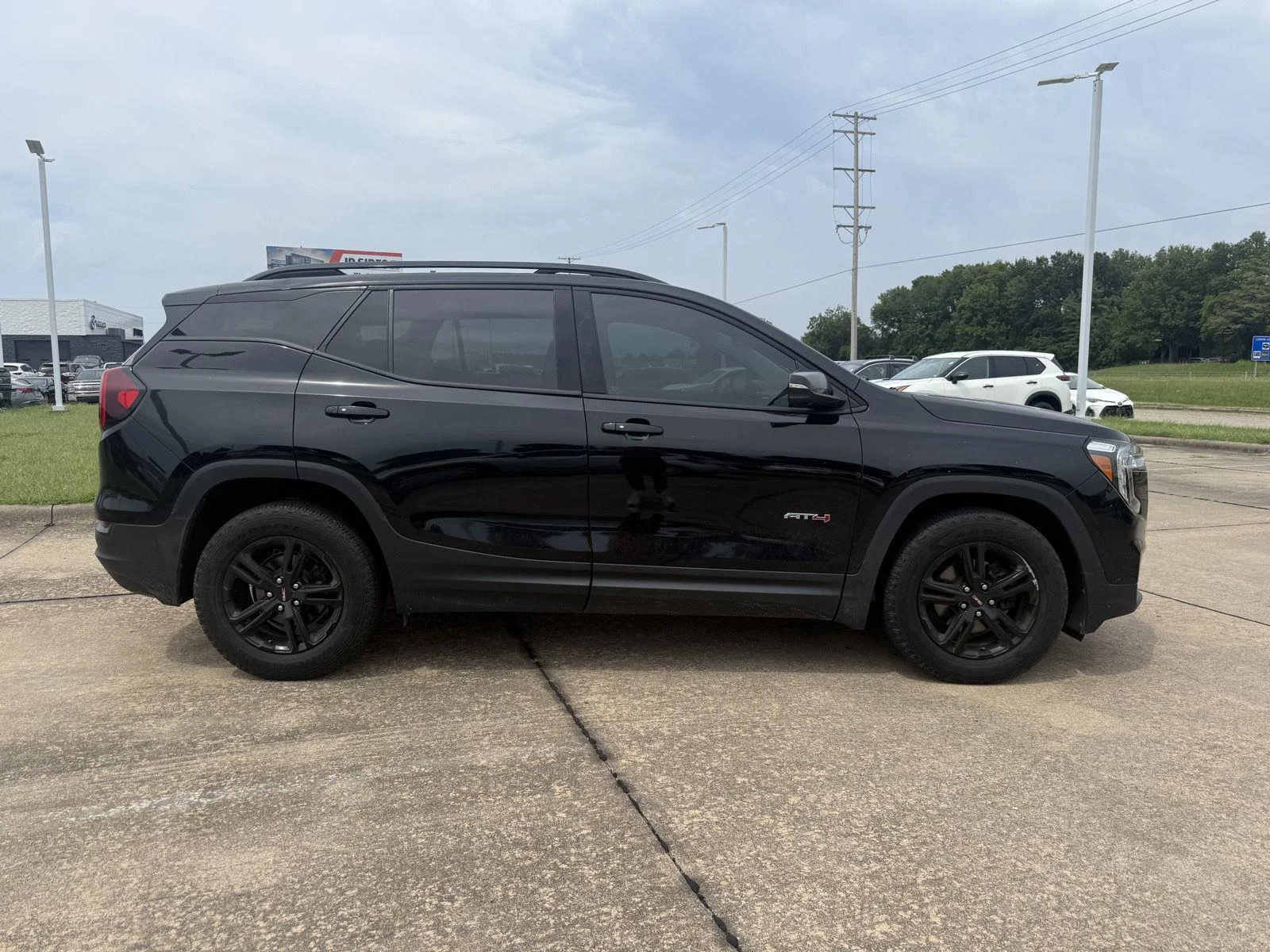 Used 2022 Ebony Twilight Metallic GMC AT4 image 3