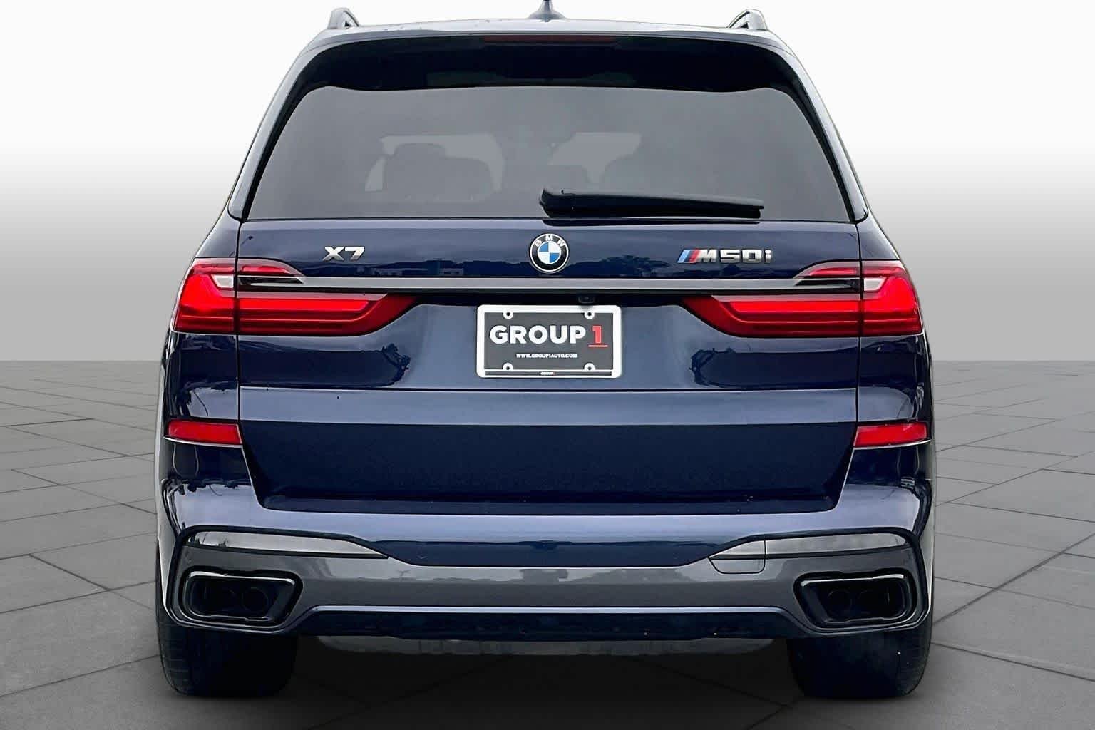 Used 2021 Tanzanite Blue II Metallic BMW M50i image 4