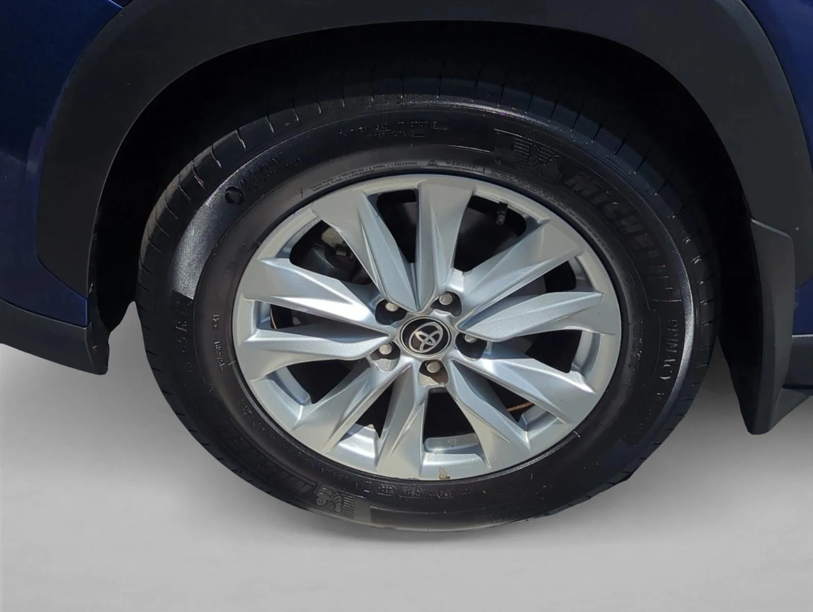 Used 2024 Blue Crush Metallic Toyota LE image 28