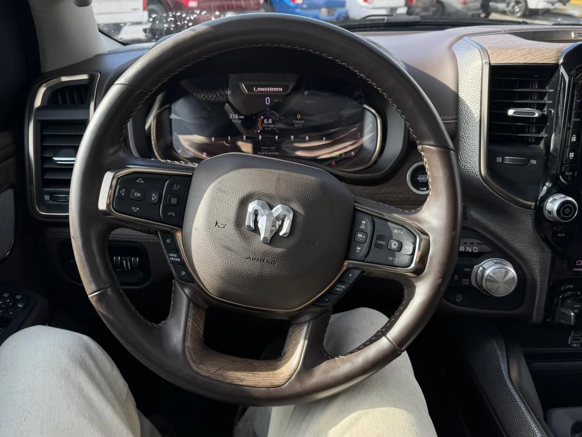 Used 2025 Silver RAM Limited Longhorn 4x4 Crew Cab 5