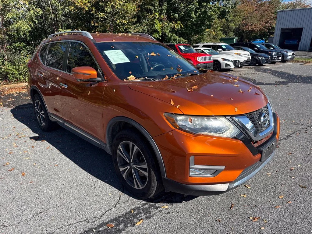 Used 2017 Orange Nissan SL image 1