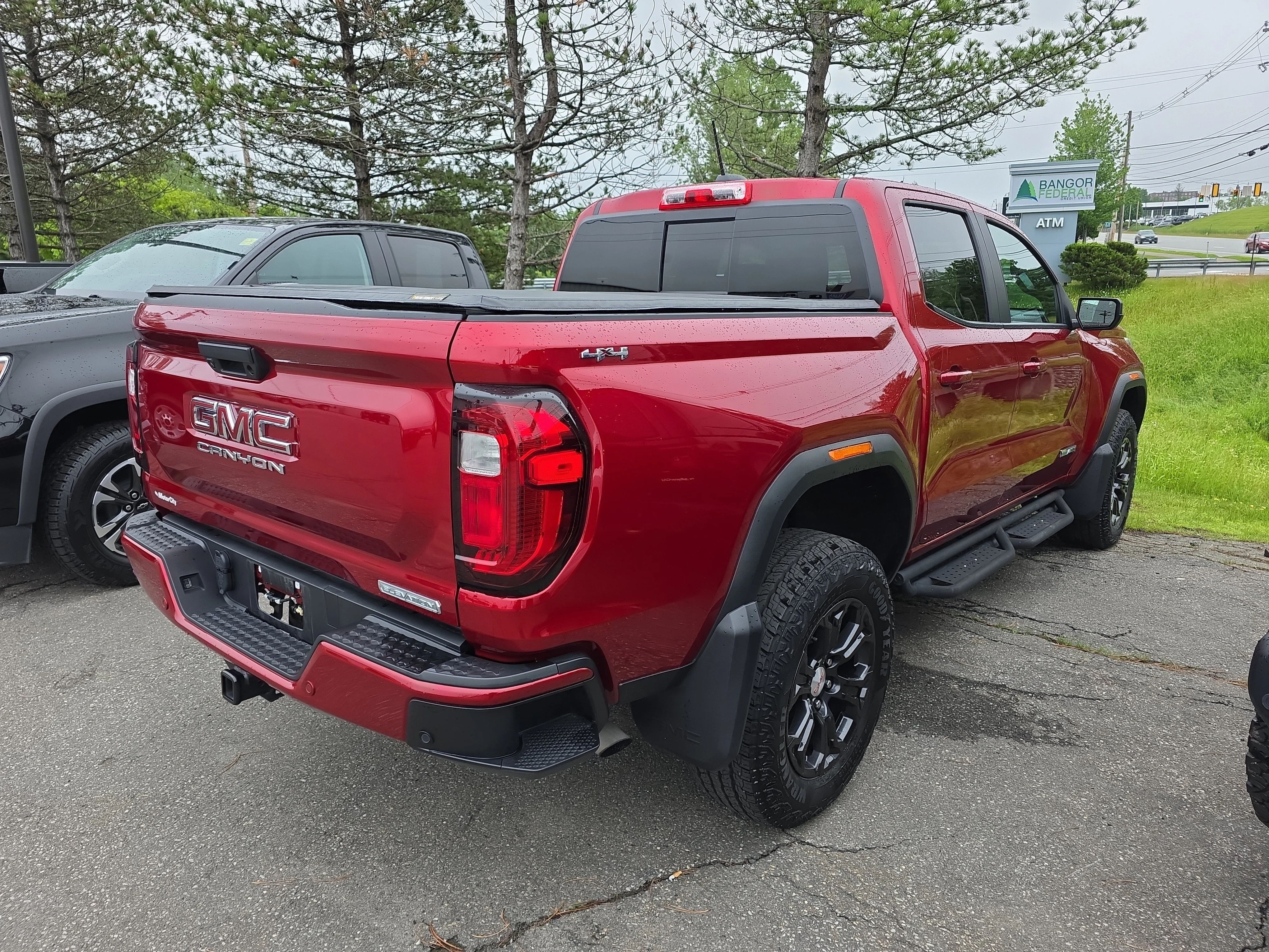 Used 2024 Volcanic Red Tintcoat GMC 4WD Elevation image 4