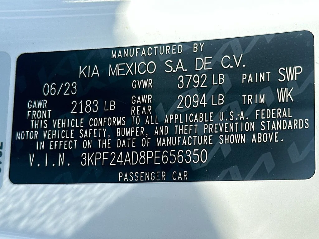 Used 2023 Snow White Pearl Kia LXS image 30