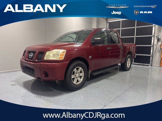 Used 2004 Red Nissan XE image 1