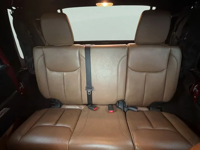 Used 2013 Red Jeep Unlimited Sahara image 18
