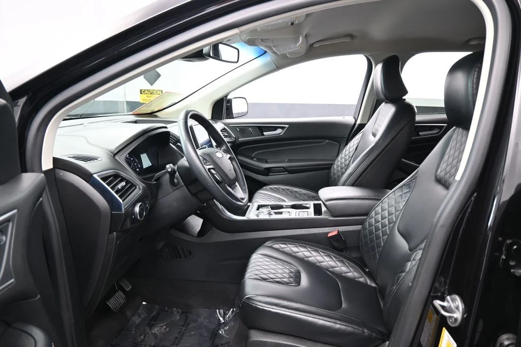 Used 2024 Black Metallic Ford Titanium image 10