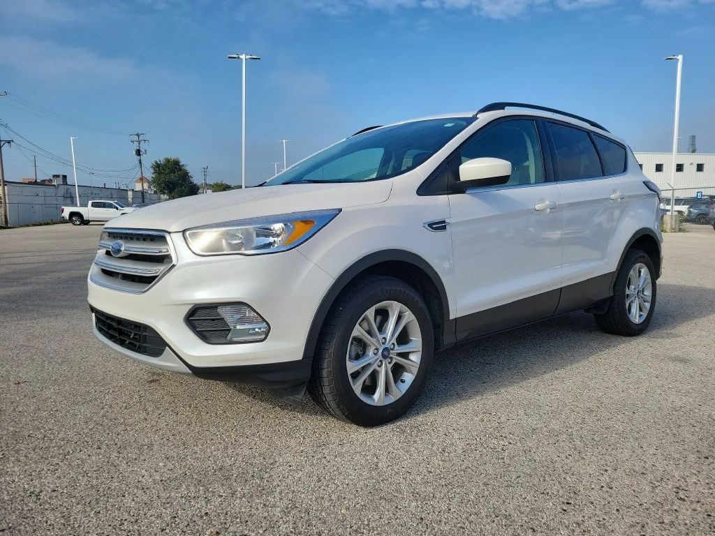 Used 2018 Ford Escape SE with VIN 1FMCU9GD3JUC02741 for sale in Muskegon, MI