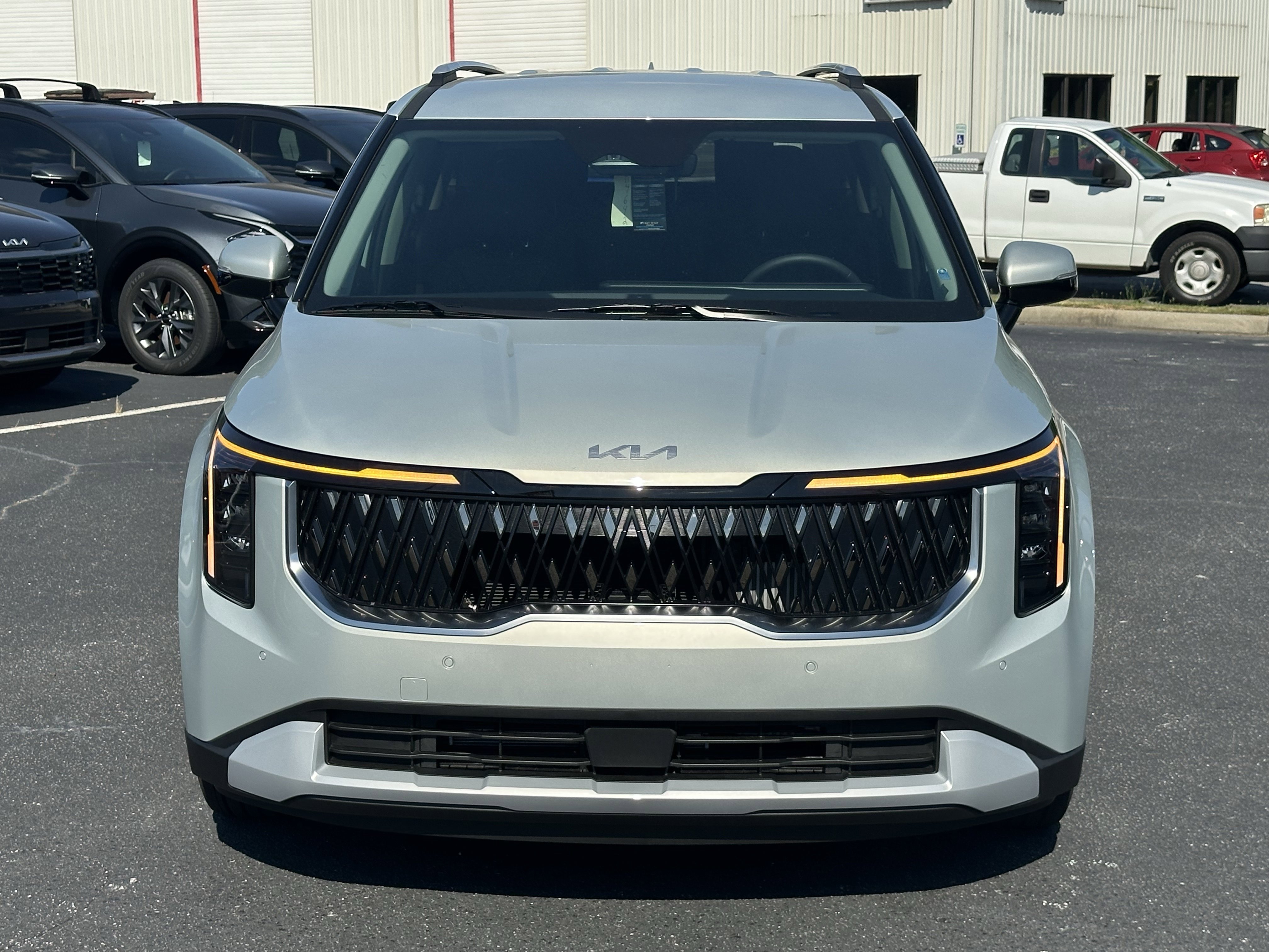 New 2026 Ivory Silver Kia EX image 3