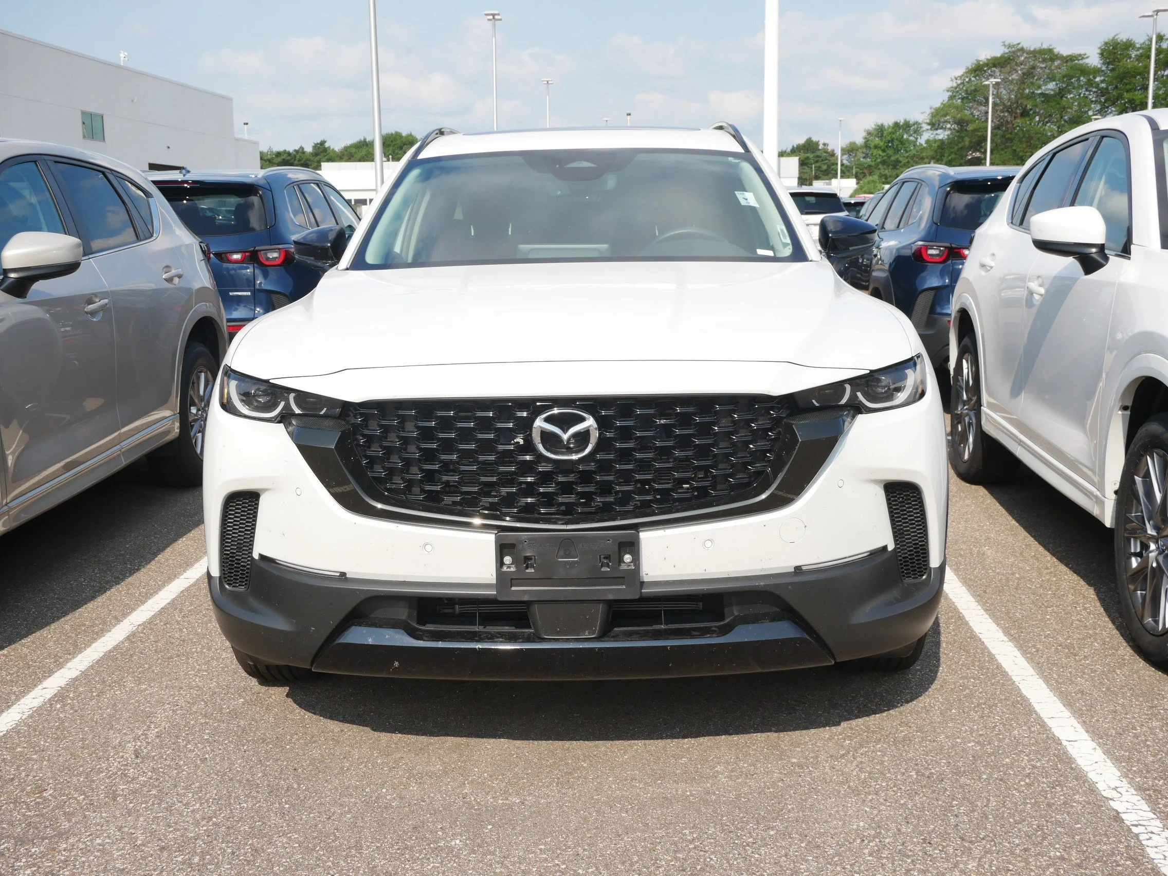 Certified 2026 Mazda CX-50 Premium with VIN 7MMVAADW2TN143806 for sale in Brooklyn Center, Minnesota