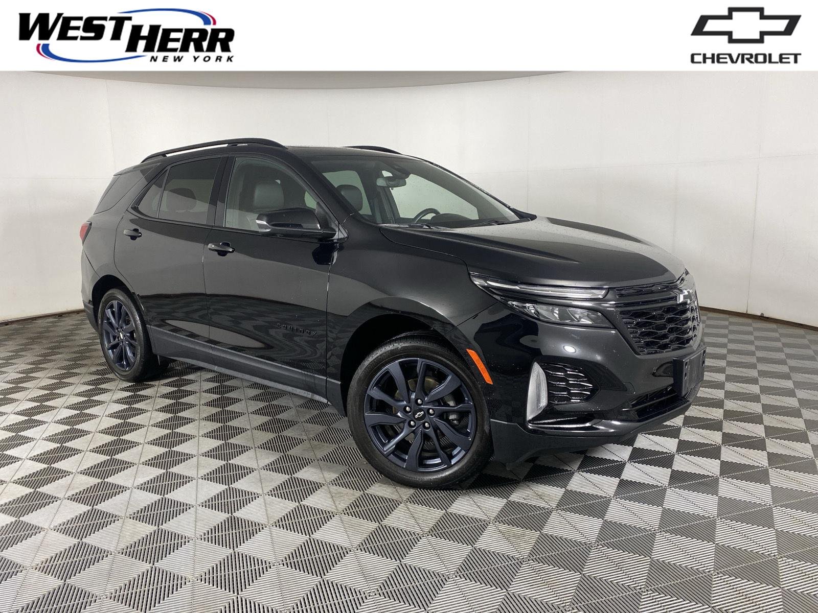 Used 2024 Mosaic Black Metallic Chevrolet RS image 1