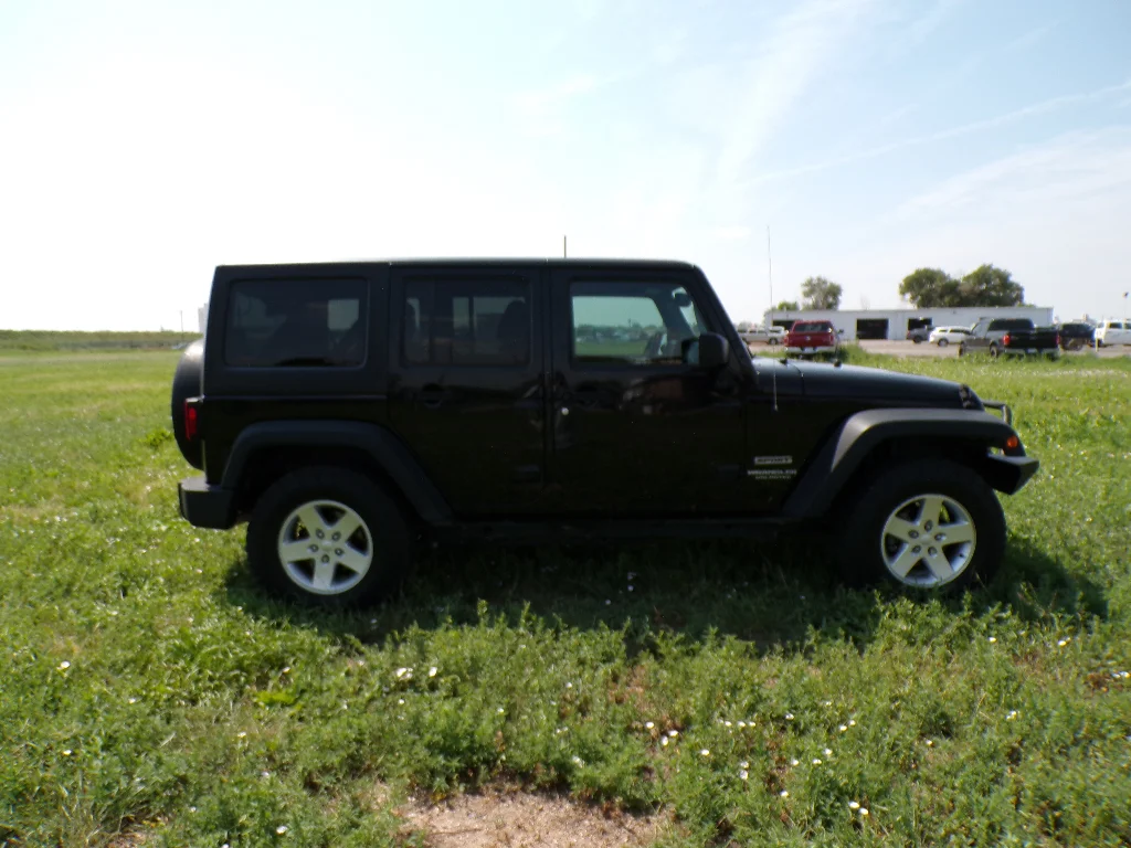 Used 2016 Black Clearcoat Jeep Sport image 4
