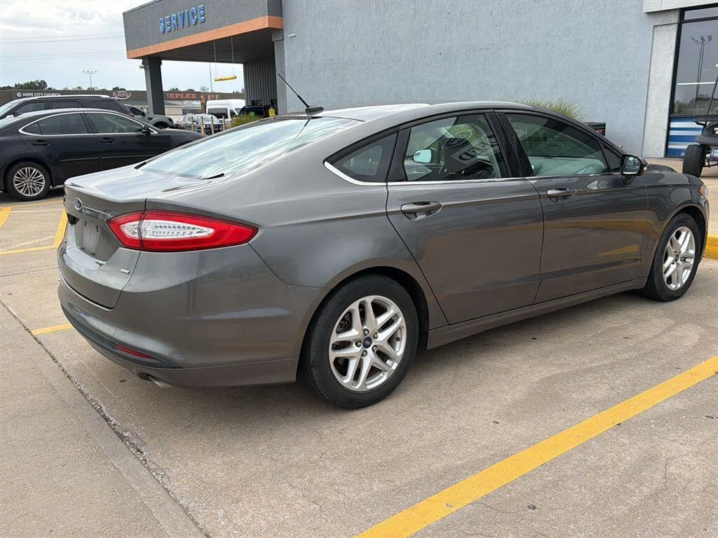 Used 2014 Sterling Gray Metallic Ford SE image 3