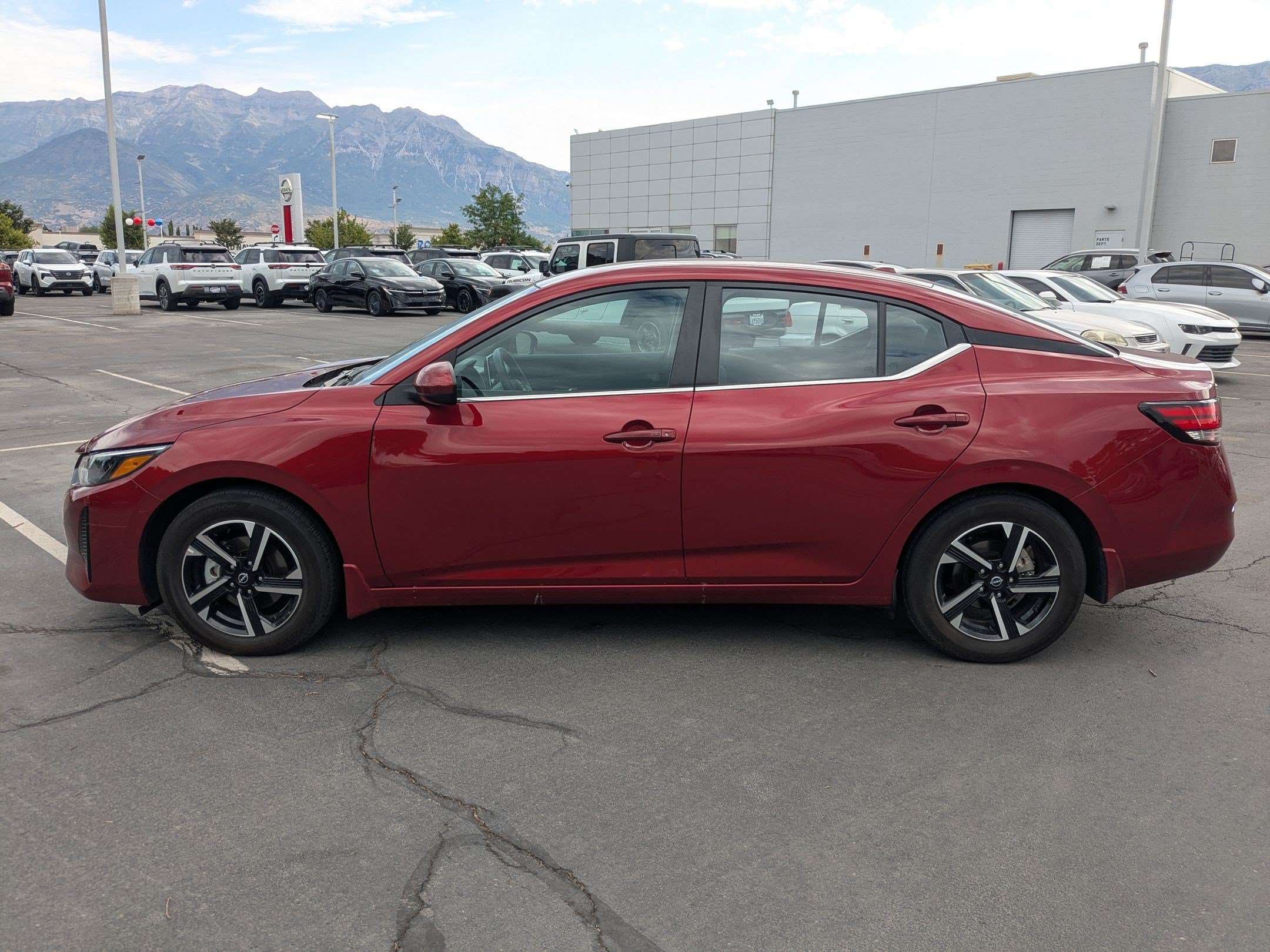 Used 2025 Scarlet Ember Tintcoat Nissan SV image 7