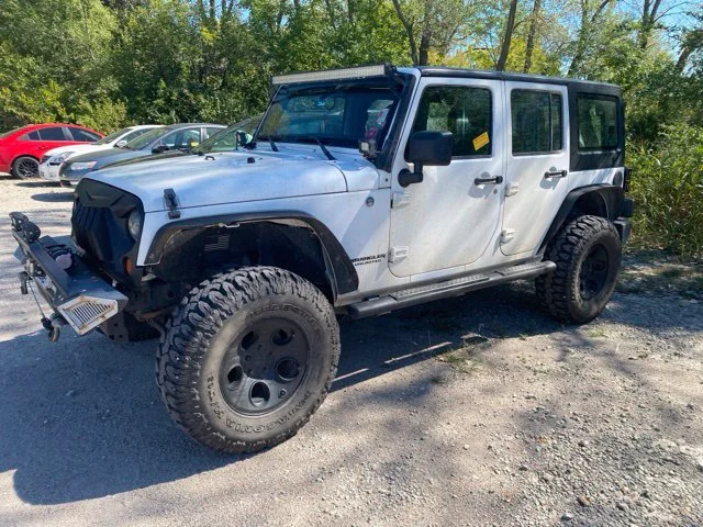 Used 2013 Jeep Wrangler Unlimited Sport with VIN 1C4BJWDG5DL608214 for sale in Augusta, KS