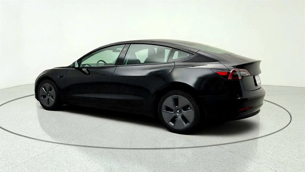 Used 2023 Solid Black Tesla RWD image 7