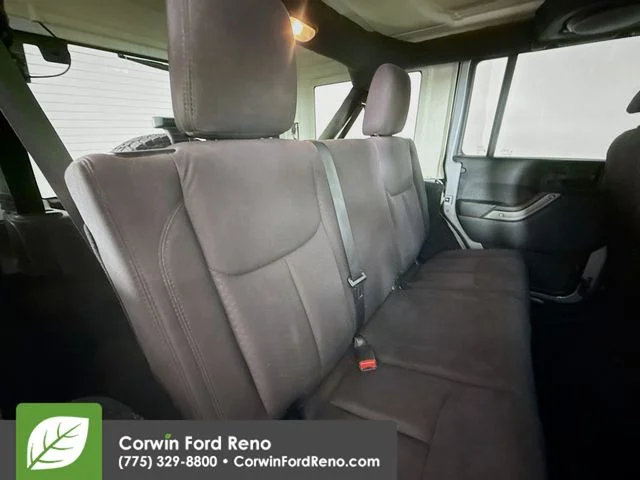 Used 2014 Billet Clearcoat Metallic Jeep Unlimited Sport image 23