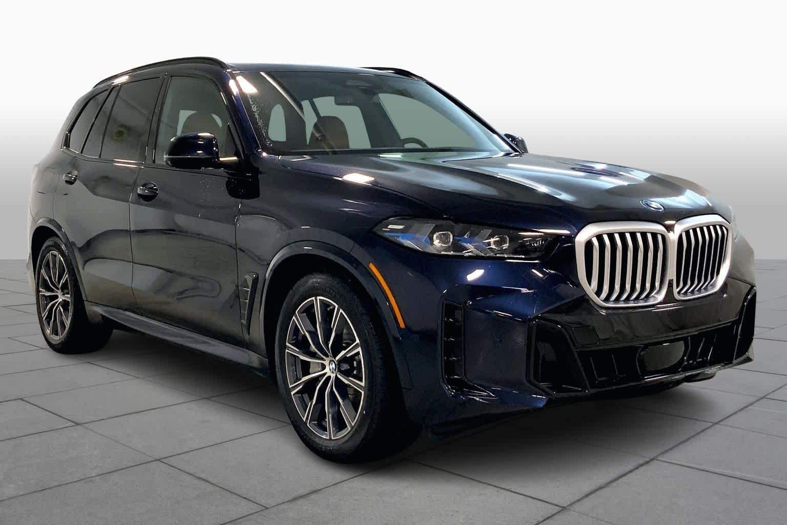 New 2026 Carbon Black Metallic BMW xDrive50e image 2