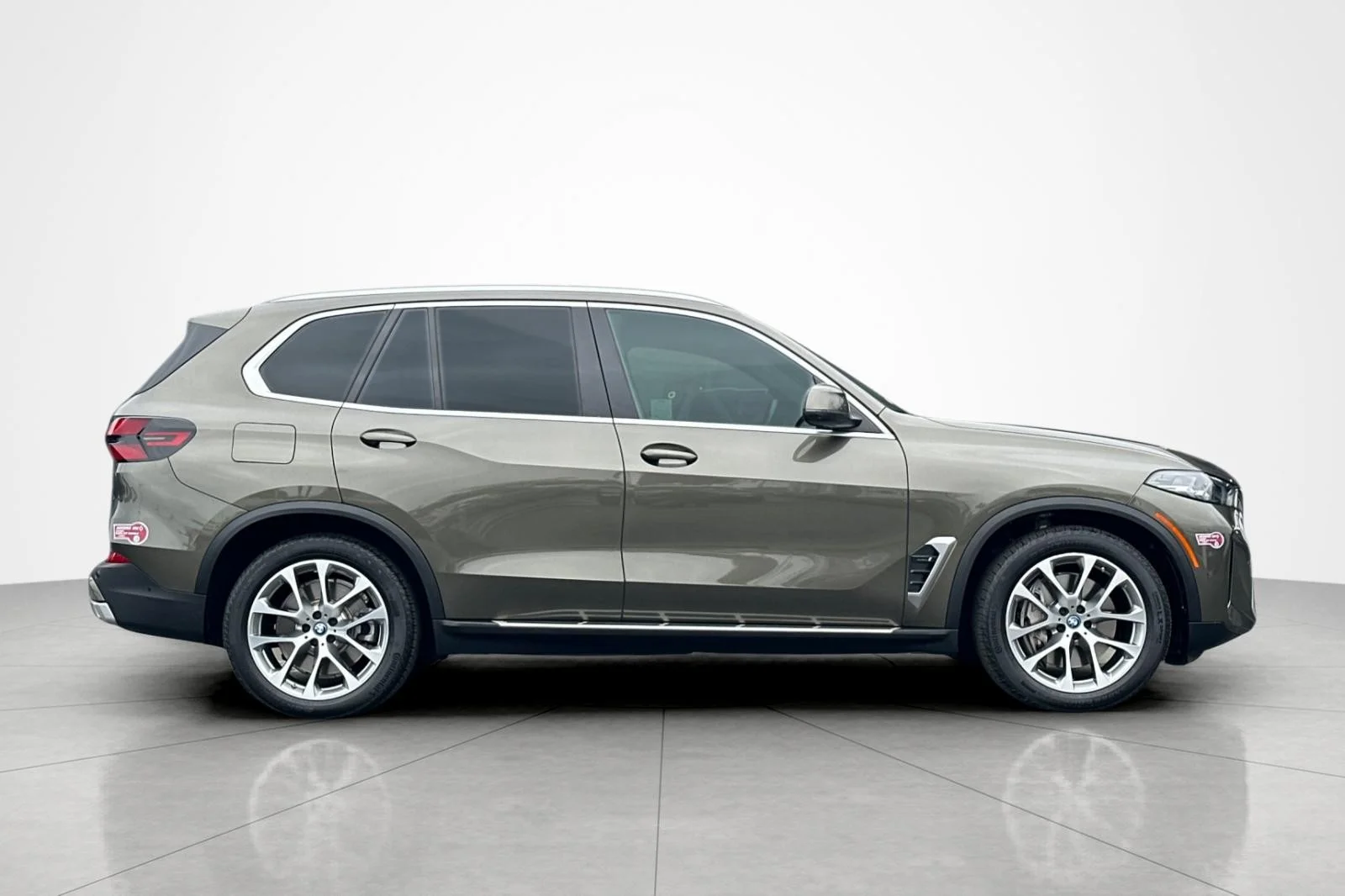 Used 2024 Manhattan Green Metallic BMW xDrive50e image 6