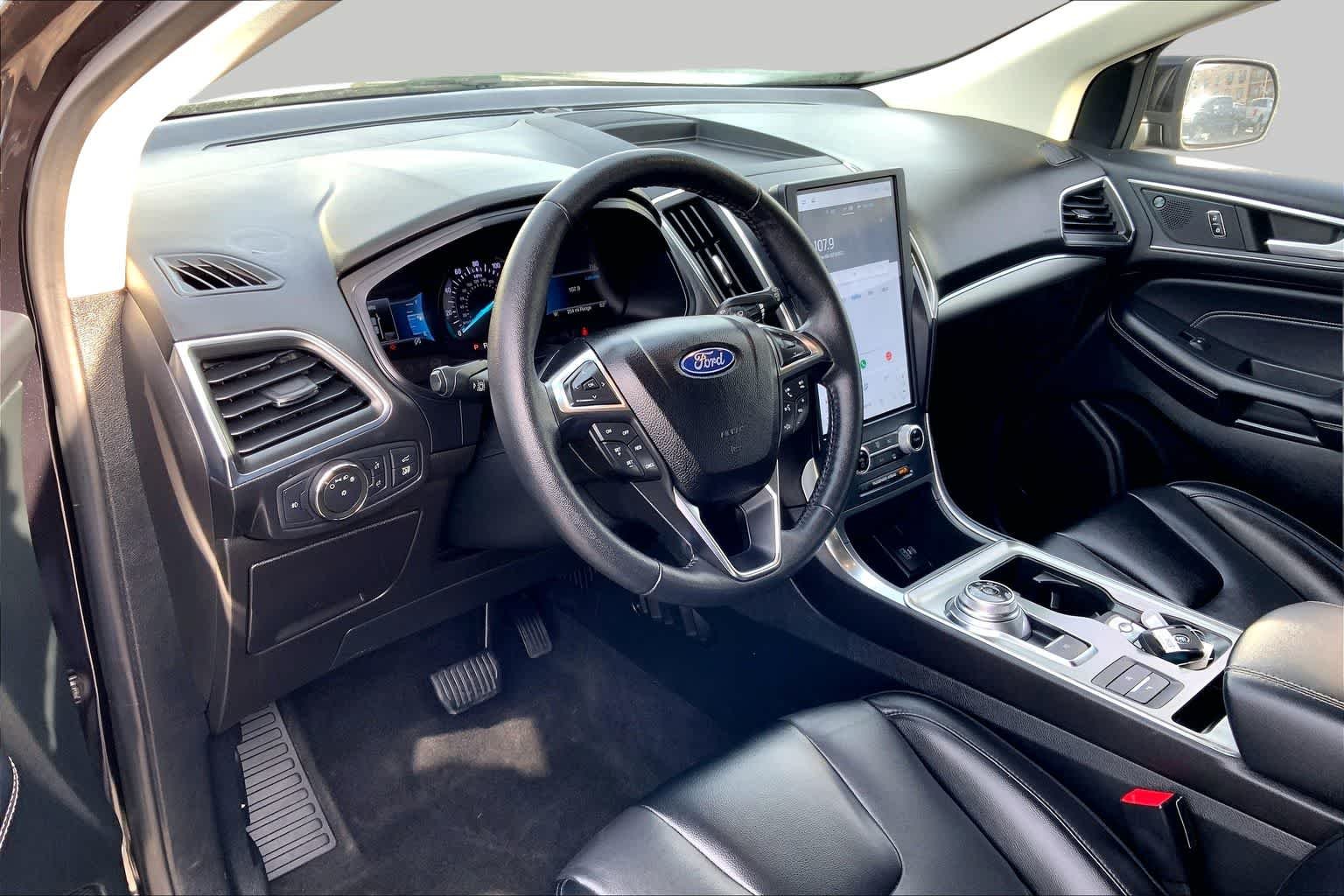 Used 2022 Agate Black Metallic Ford Titanium image 16