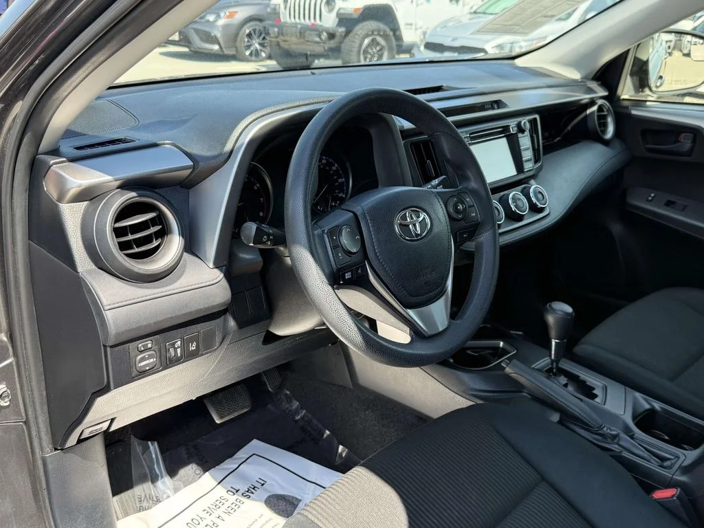 Used 2018 Magnetic Gray Metallic Toyota LE image 2