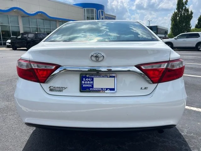 Used 2016 Super White Toyota LE image 5